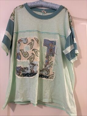 NWOT POL oversized T-shirt with 91 on the front. Round neck